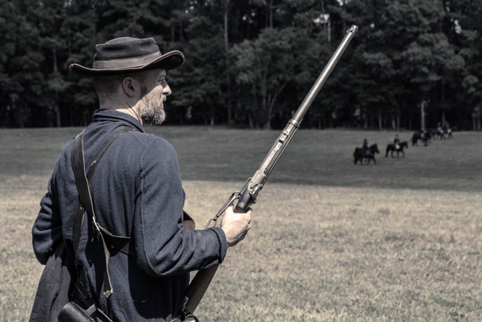 A volunteer living historian portrays a member of Colonel Wilder's Lightning Brigade A volunteer living historian portrays a member of Colonel Wilder's Lightning Brigade