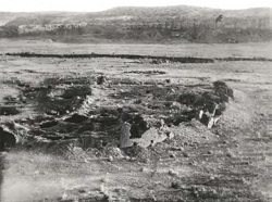 Pueblo Bonito unexcavated showing dirt on top of the walls