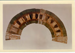 A painted wooden headdress in the Chaco Canyon archives.