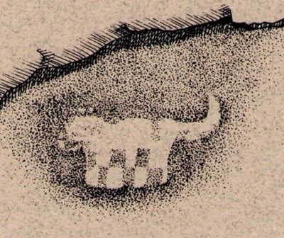 A painted image on rock of a jaguar-like figure with 4 legs and a tail.