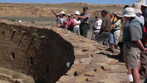 Photo of Park Ranger Ron Sutcliffe and visitors at Casa Rinconada