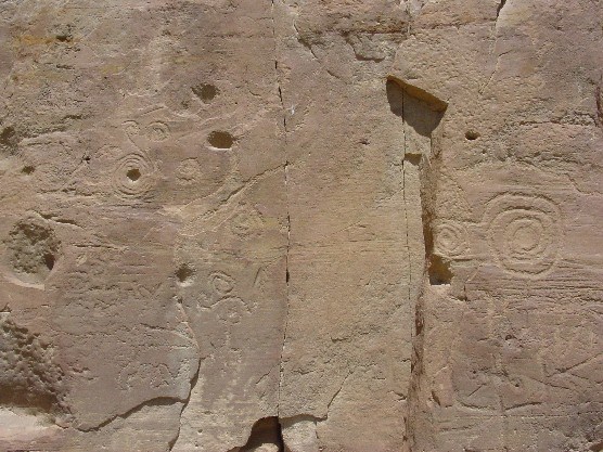 Photo of interconnected spirals and petroglyphs