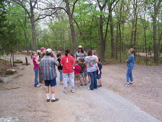 female ranger leading walk.