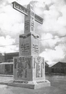 Concrete monument in a street intersection Concrete monument in a street intersection