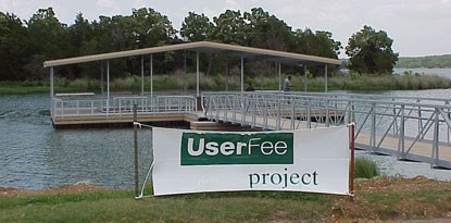 fishing dock with poster display in front