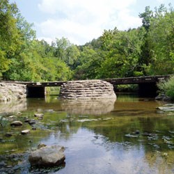 Rustic stone causeway over a creek