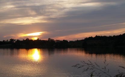 Sunset reflected onto Veterans Lake