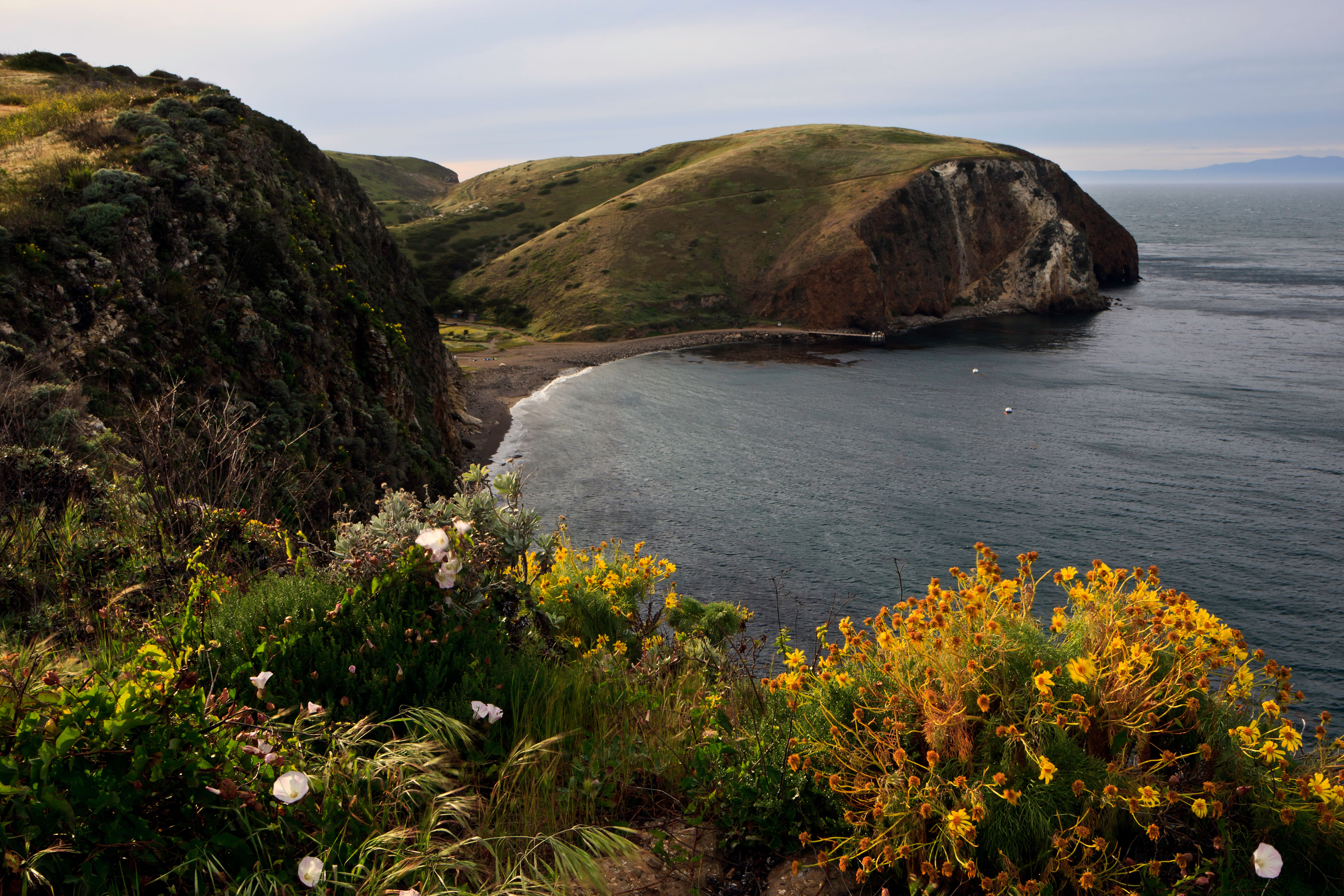 shallow bay with bluffs and rocky beach