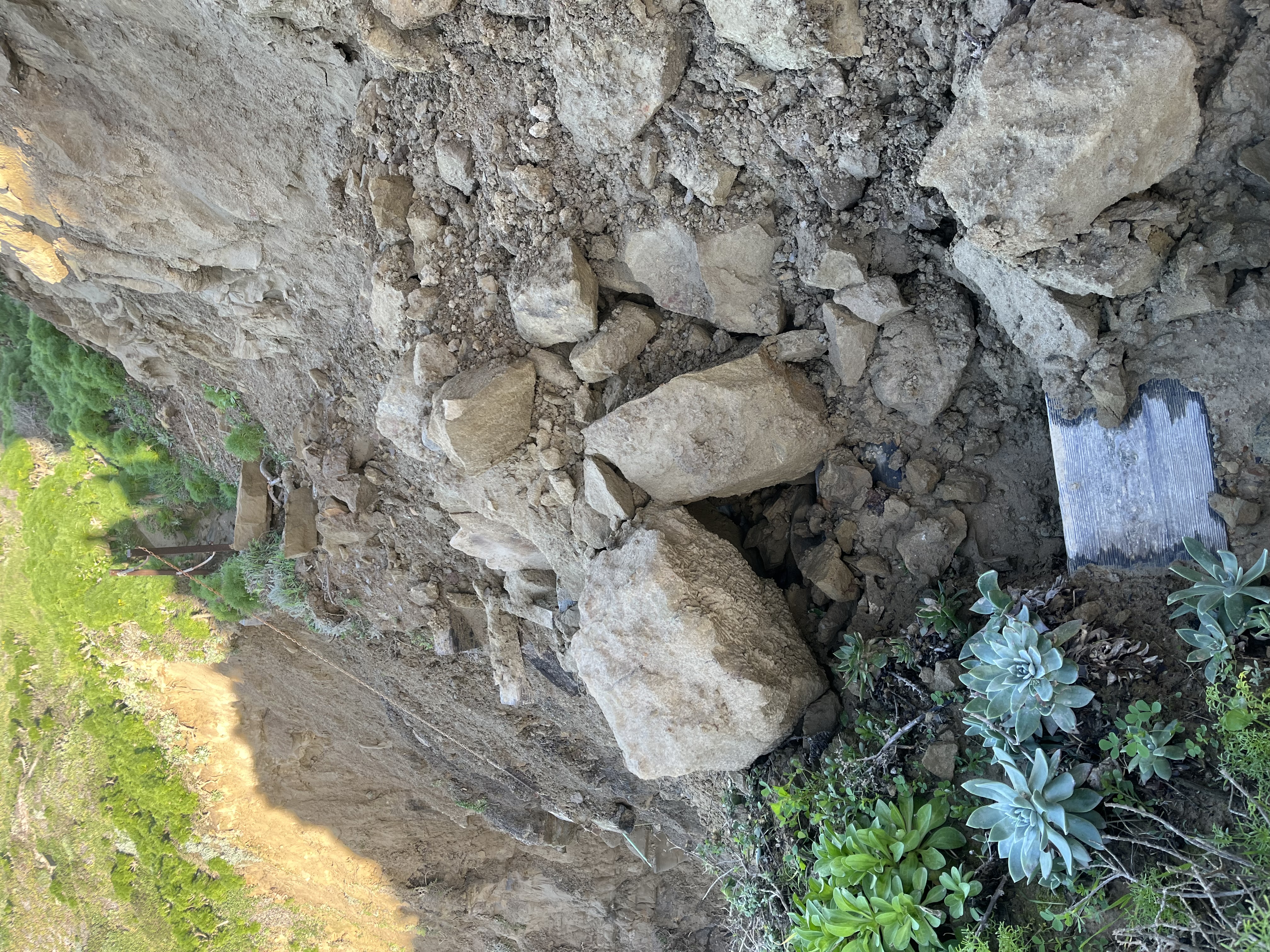 fallen rocks across a trail