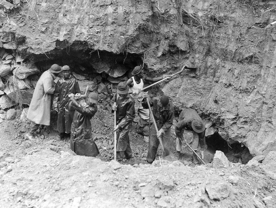 Members of the Civilian Conservation Corps repairing a section of the towpath of the C&O Canal.