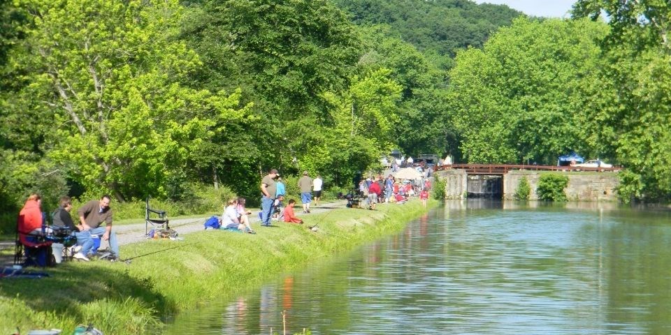 Park visitors enjoying a special fishing event along the canal.