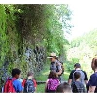 Park visitors on the towpath learning about the C&O Canal