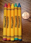 Crayons and coin (NPS Photo)