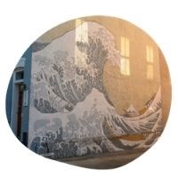 Georgetown Public Art Self-guided Tour Building mural of the Great Wave in Georgetown.