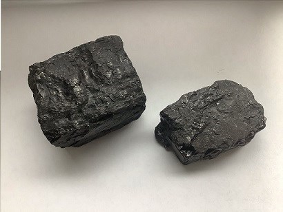two chunks of bituminous coal