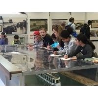 Students viewing a museum exhibit.
