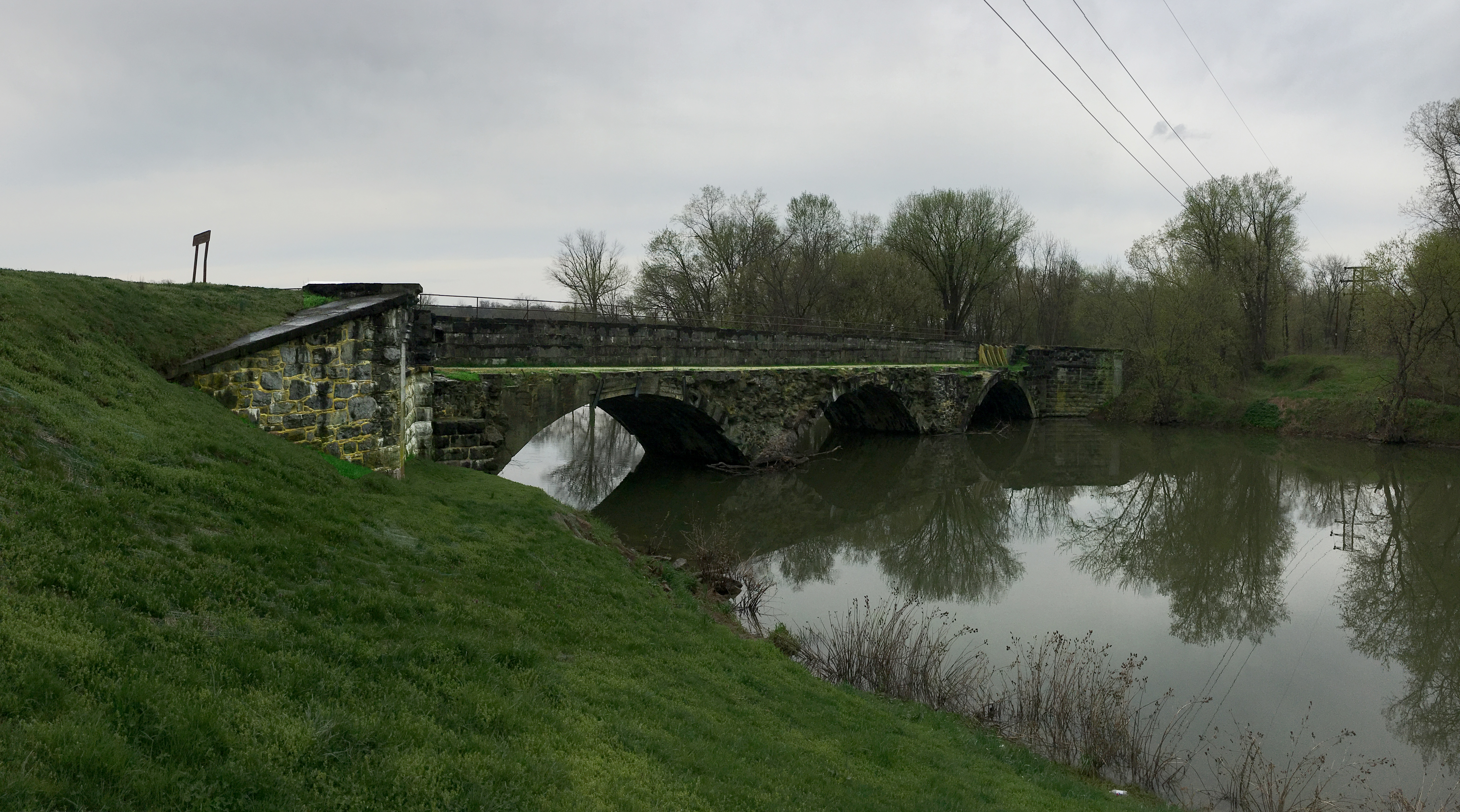 The Conococheague Aqueduct before restoration on a cloudy day.