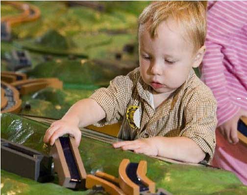 A child enjoys one of the interactive displays at the park. edited-canal-child
