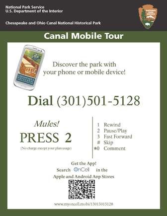Tour sign with information on how to call or download the app. Tour sign with information on how to call or download the app.