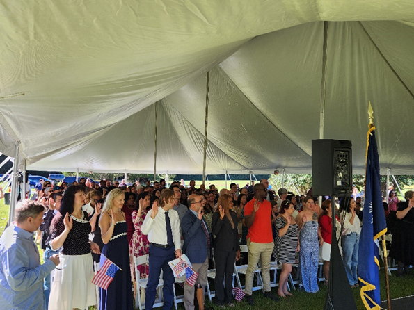 New Americans take the Oath of Citizenship New Americans take the Oath of Citizenship