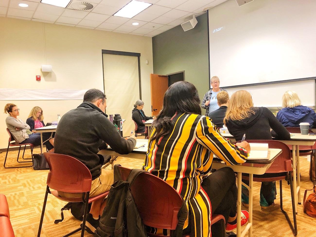 Teachers seated at desks in the visitor center participate in the park's Civil Rights Educator Institute.