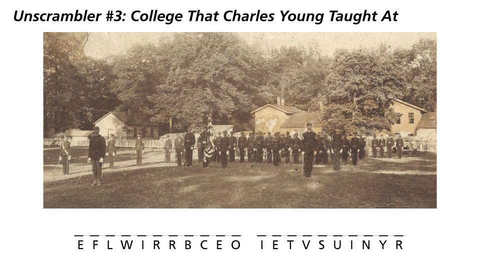 Unscrambler-3 Image of several men wearing dark-colored uniforms standing in neat rows and columns outside