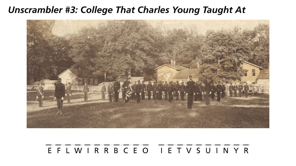 Unscrambler-3 Image of several men wearing dark-colored uniforms standing in neat rows and columns outside