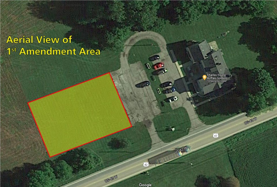 Aerial view of land showing a highlighted area with text reading First Amendment Area above it.