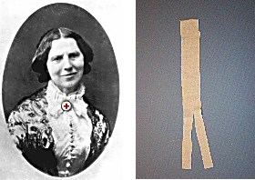 Clara Barton wearing a Red Cross pin at her neck and image of a bandage. Clara Barton wearing a Red Cross pin at her neck and image of a bandage.