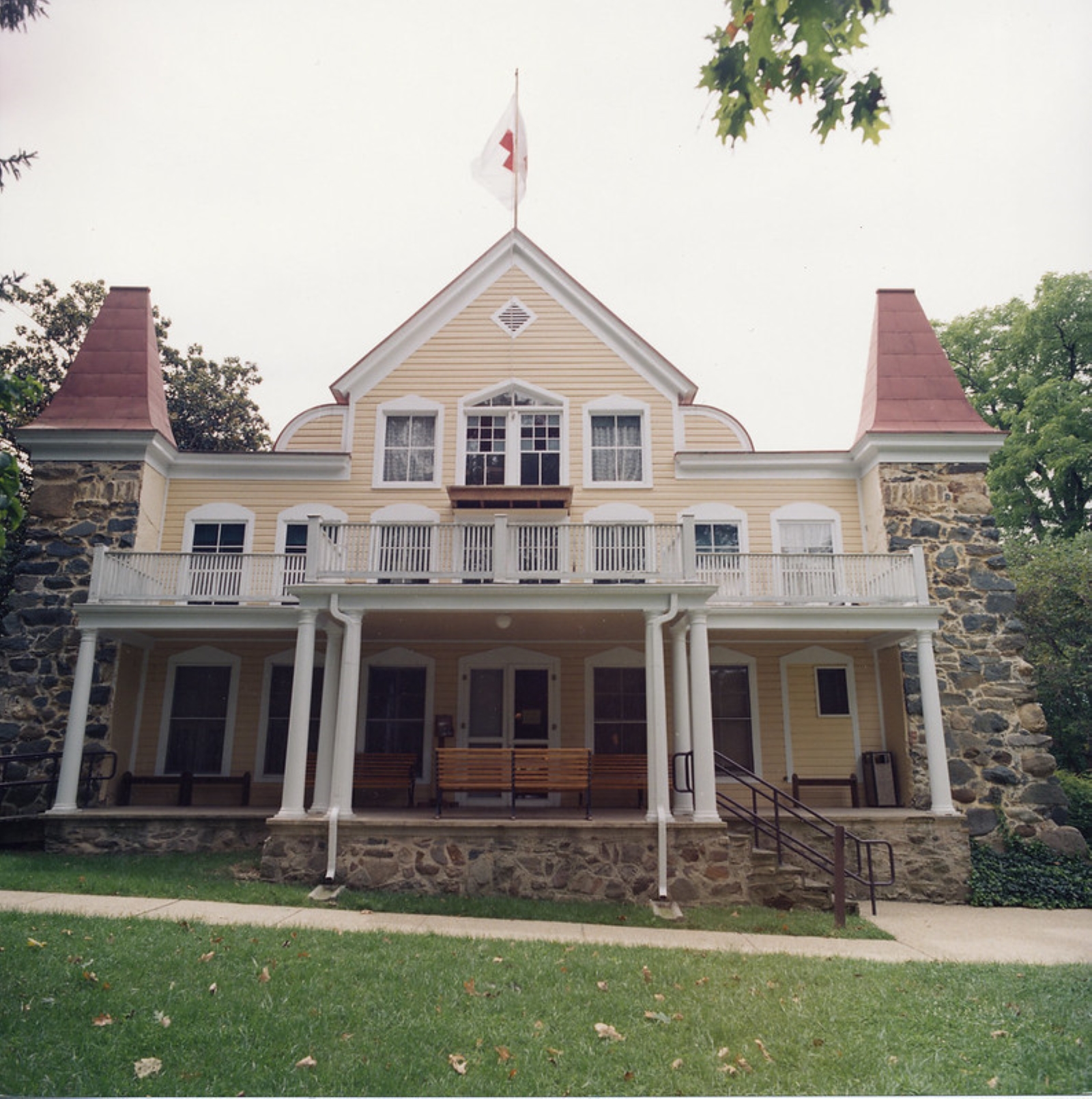 Clara Barton House A wooden and stone building.