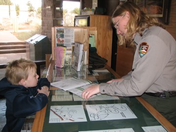 Ranger with new Junior Ranger Ranger with new Junior Ranger