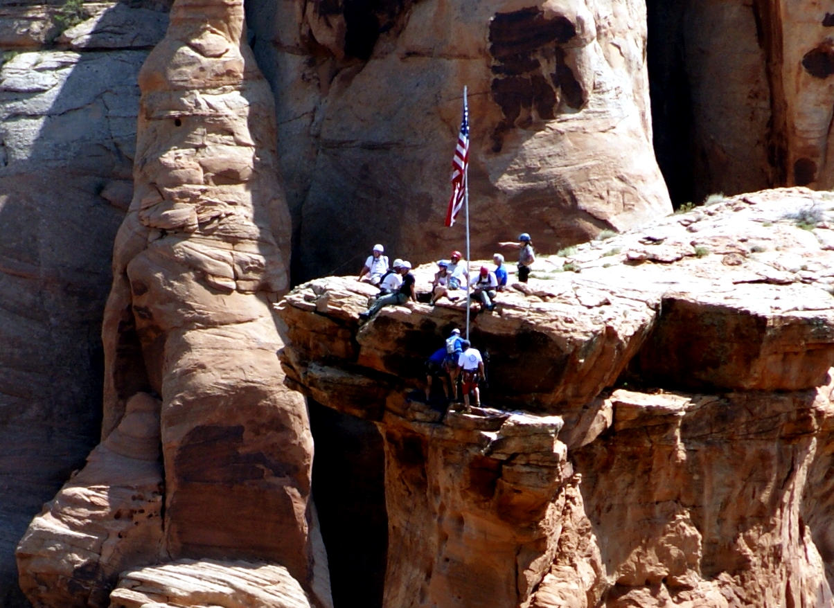 Raising the Flag on Top of Independence Monument