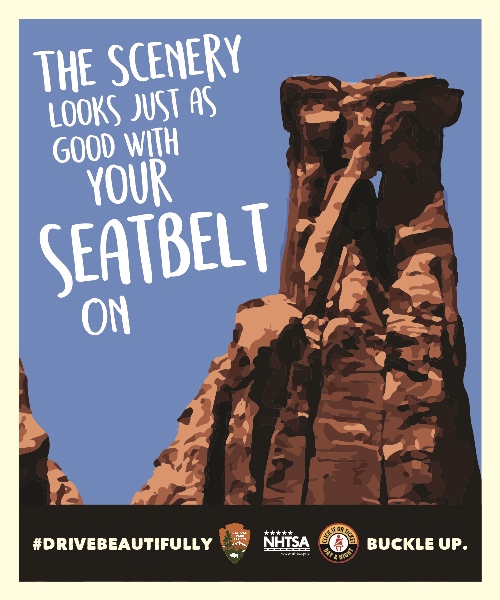 A stylized image of Kissing Couple rock formation with the words "The scenery looks just as good with your seatbelt on