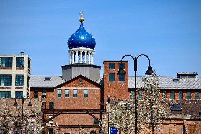 brick buildings with a blue onion dome
