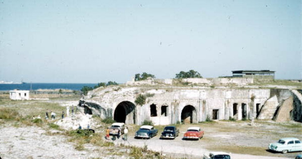 Fort Pickens Then: Cars parked on parade ground near Bastion D (ca. 1950s)