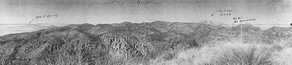 Black and white photo of a rocky mountain range