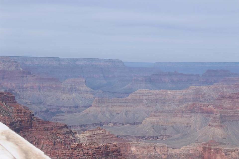 Webcam view on a clear day showing peaks, ridgelines and cliffs within a mile deep canyon landscape