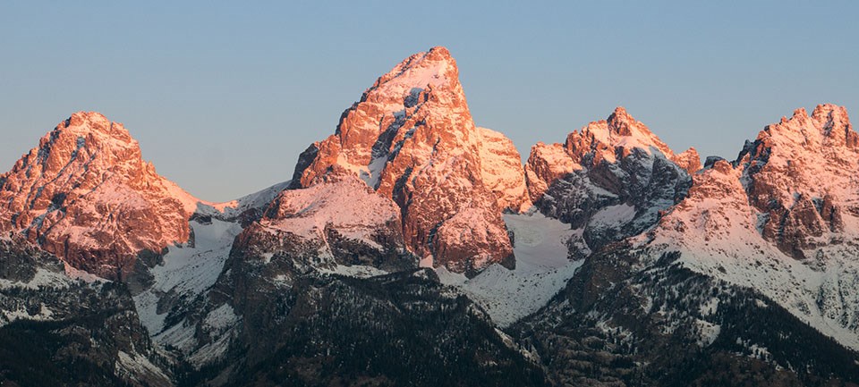 Tin cans form an image of the Teton Range.