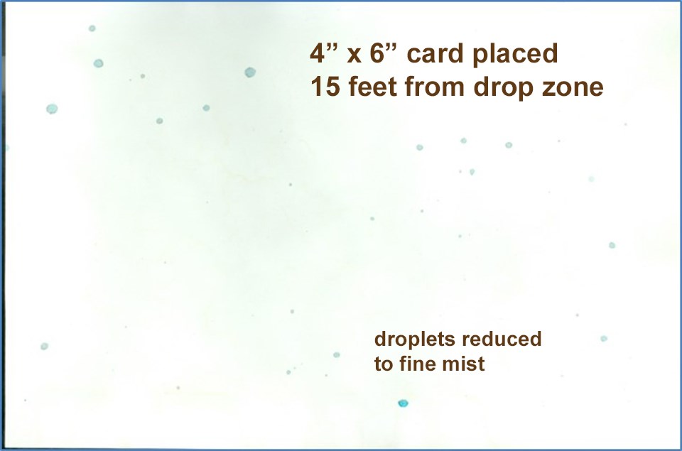 4 x 6 card splattered with rainsized blue droplets of herbicide.  The card is covered with splatter