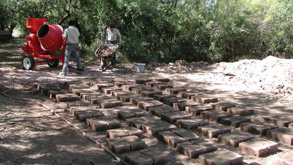 illustration of adobe bricks drying in the sun