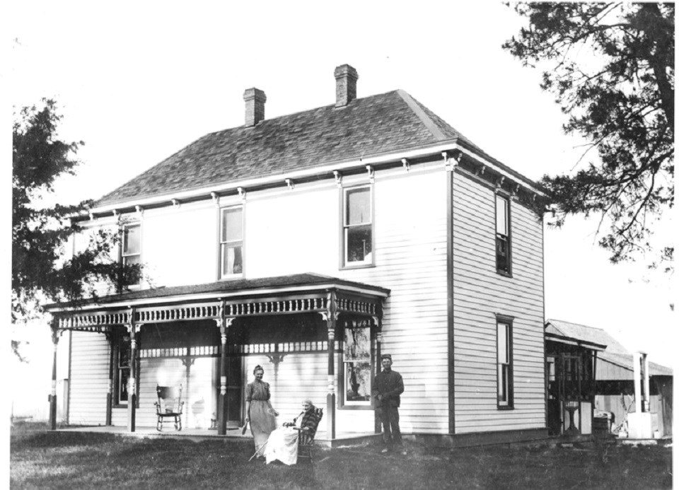 Large farm house, Harry Truman posing with his mother and grandmother