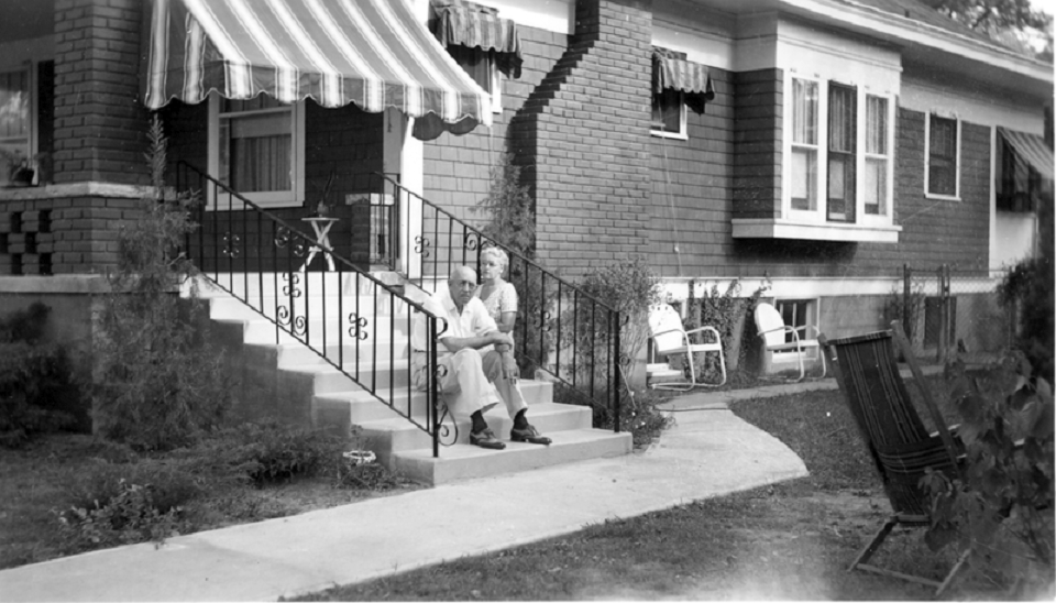 Brick bungalow-style house, Frank and Natalie Wallace posing