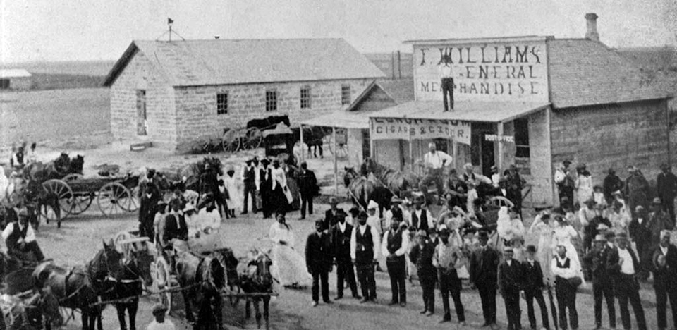 Residents of Nicodemus, Kansas, in the town square