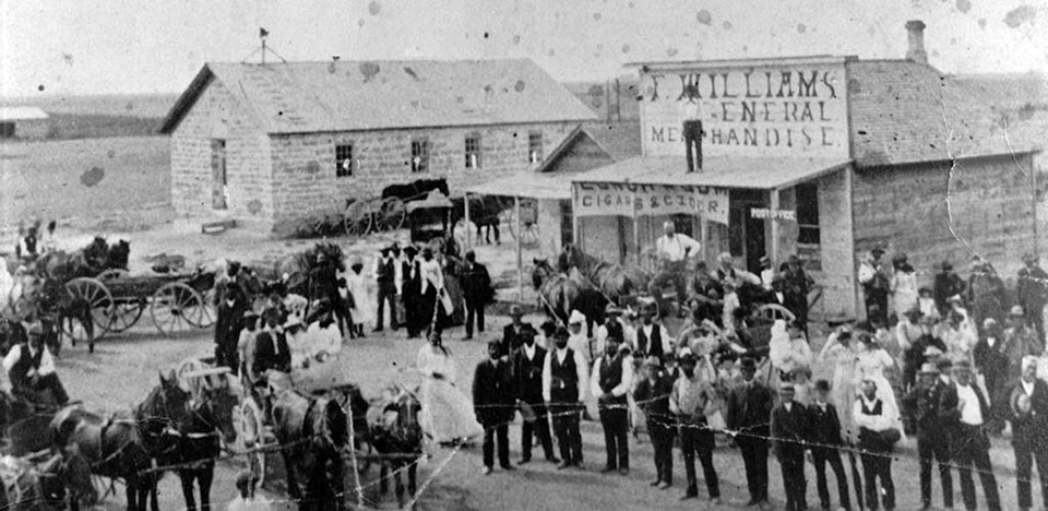 Residents of Nicodemus, Kansas, in the town square