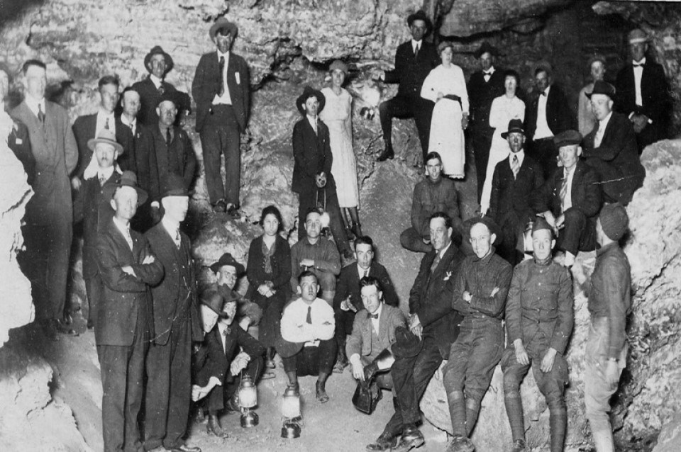 Black and white image of early tour group in the Model Room