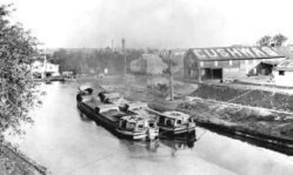 Cushwa Building and Basin during the heyday of the canal with Canal Boats in the Basin.