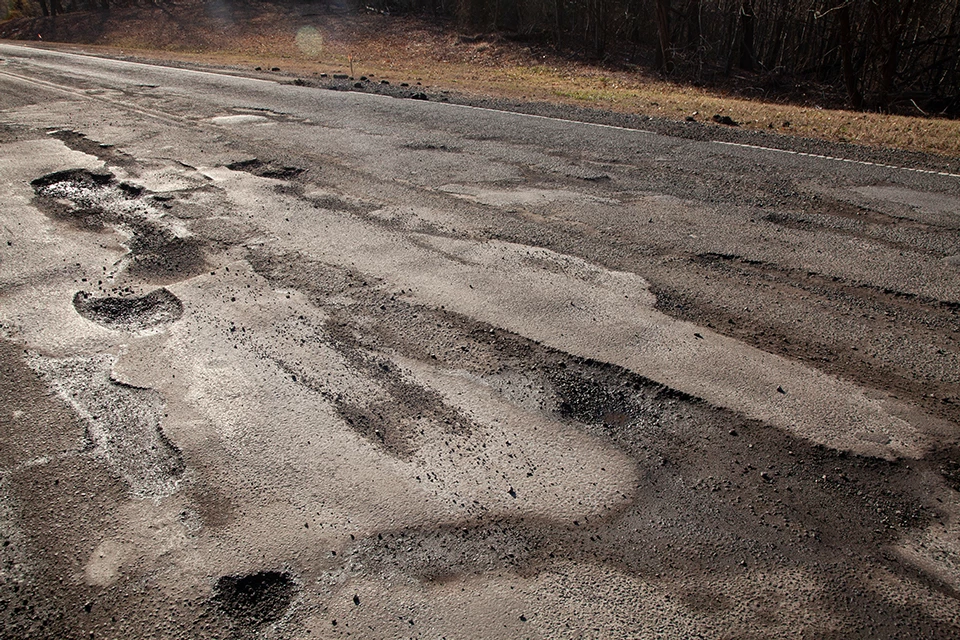 holes in blacktop on fort davis drive