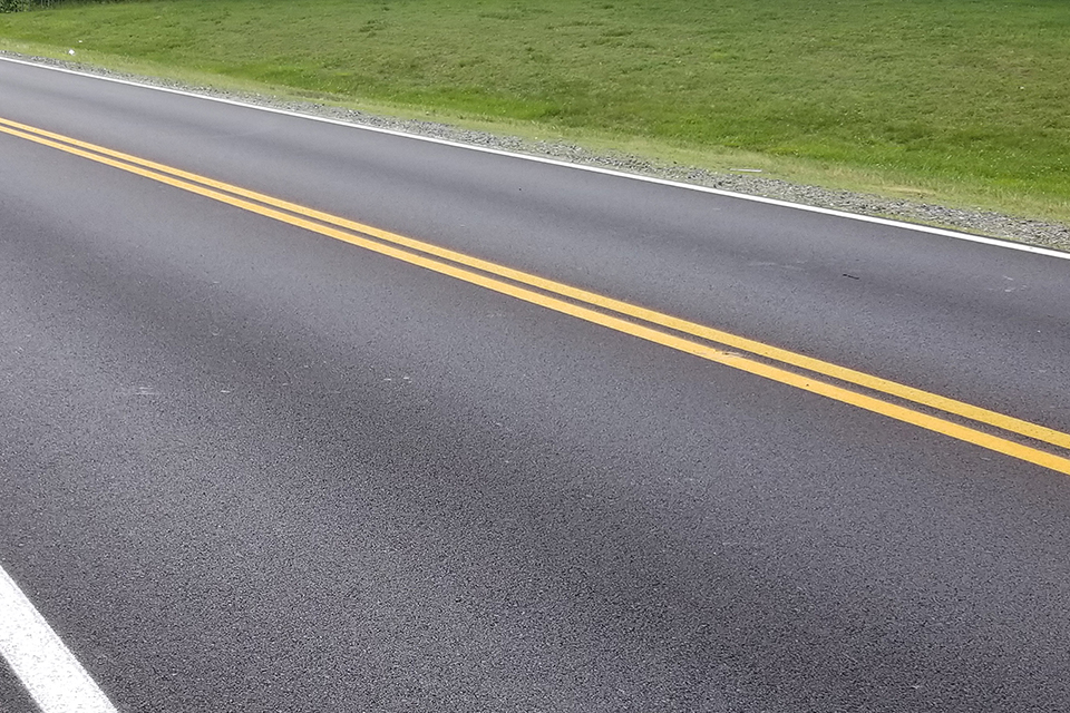 holes in blacktop on fort davis drive