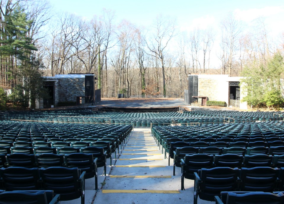 Black and white photo of a stage and seating area