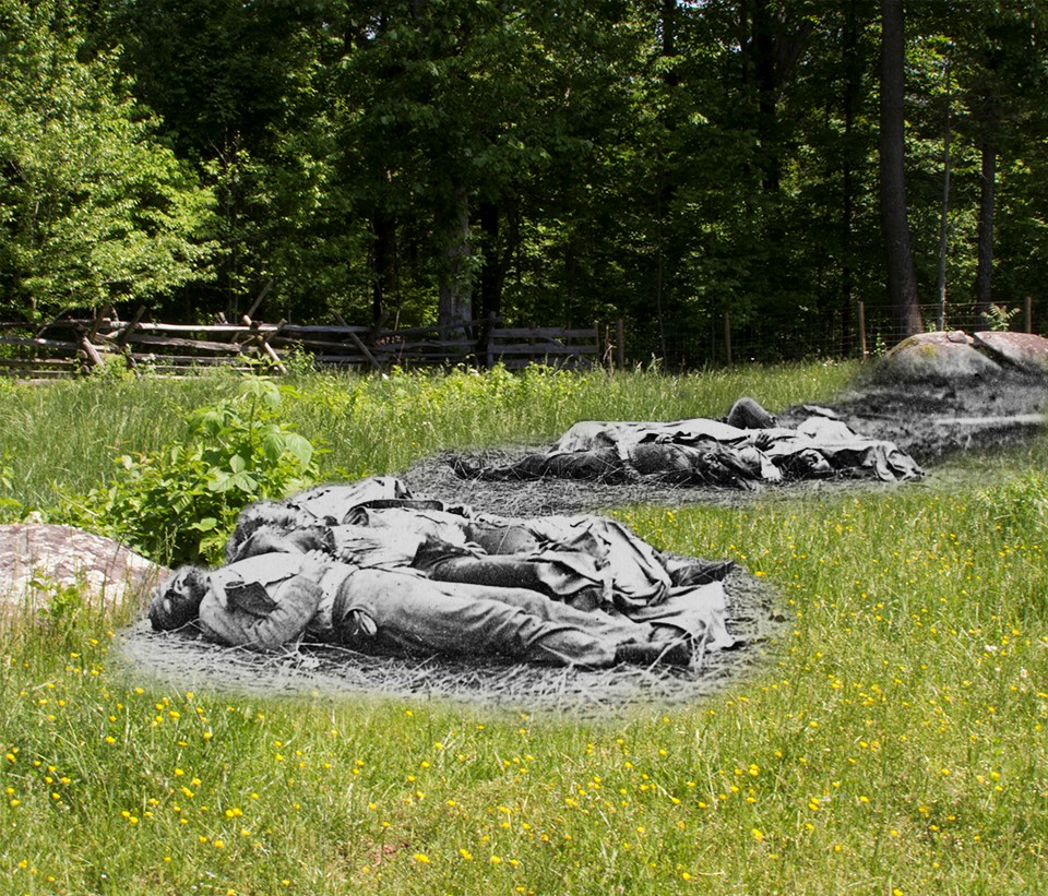 A group of Confederate dead lie near the edge of the Rose Woods.